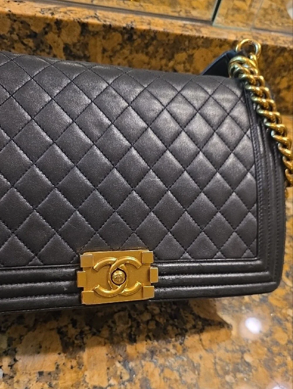 CHANEL Medium Boy Bag Quilted Lambskin Crossbody with Gold Hardware.